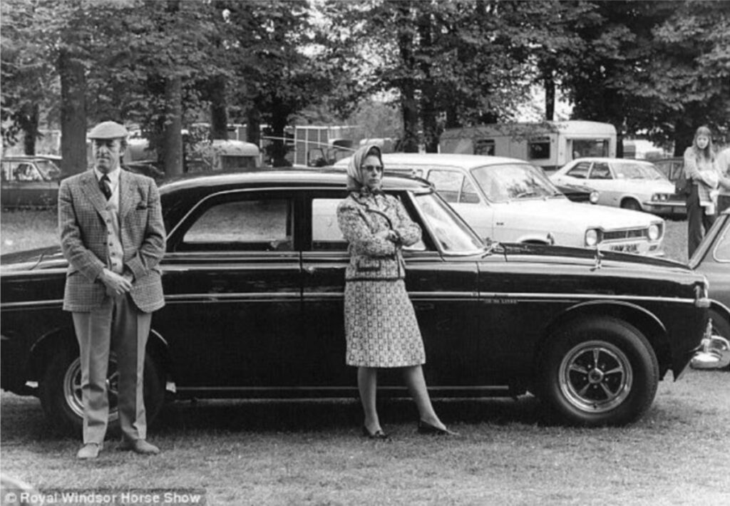 Queen Elizabeth II standing in front of the Rover P5B. Photo credit: Royal Windsor Horse Show.